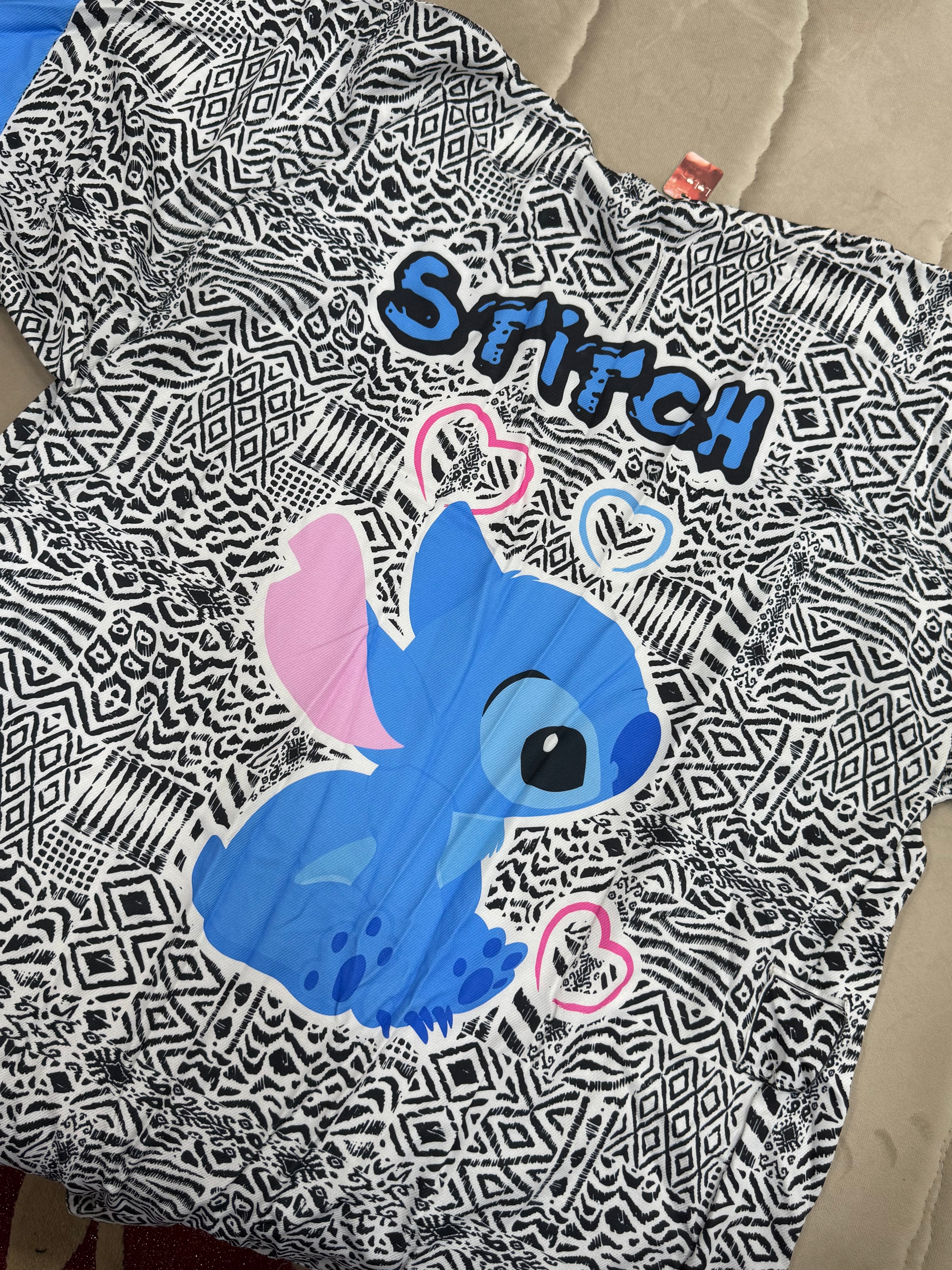 ‏stitch cardigan
